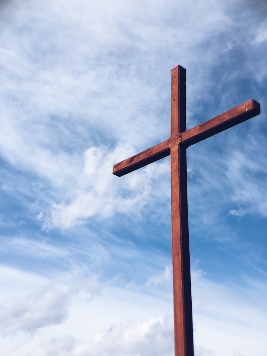 a brown wooden cross - The Christian March To Power In America